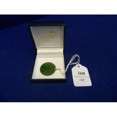 360 - A 14 carat gold mounted jade disc pendant