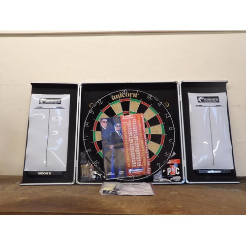 388 - A Unicorn dart board, cabinet and accessories