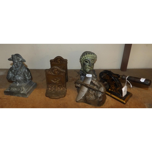 150 - A pair of metallic book ends in the marinal style, a vintage seal stamp and various models