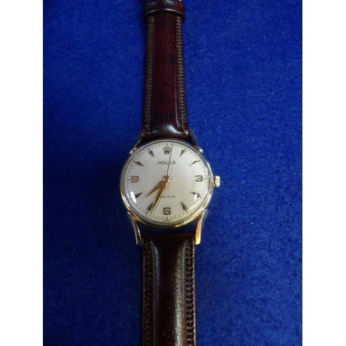 164 - A 1948 Rolex Precision manual wind wrist watch in 9 carat gold 31mm case