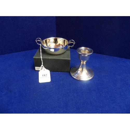182 - A silver Jersey christening bowl together with a silver short candle stick holder