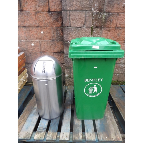 44 - A green PVC wheelie bin together with a brushed steel waste bin