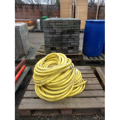 67 - Two coils of Torsino commercial hose pipe