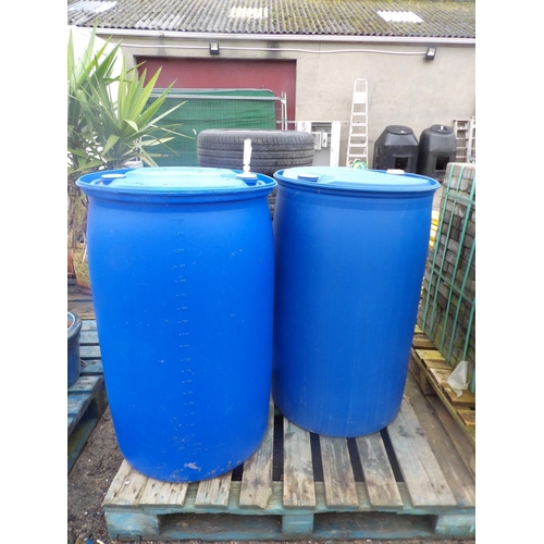 77 - Two blue PVC 220L barrels