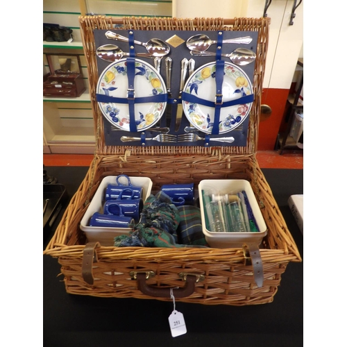 251 - A wicker picnic hamper and contents by Amberley