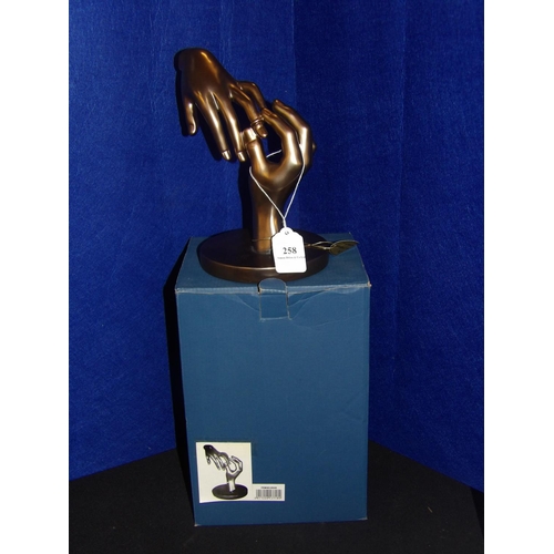 258 - A sculpture of hands