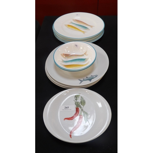 265 - A range of Jersey Pottery plates and dishes