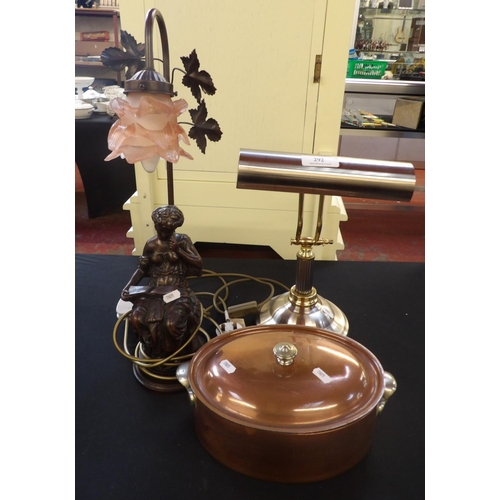 292 - A desk lamp, a figural table lamp and a lidded copper casserole dish