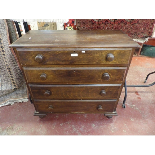 337 - A vintage pine chest of four long graduated drawers in original grained finish