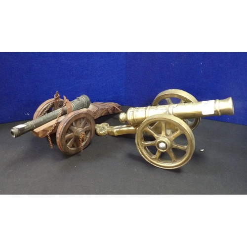 346 - An ornamental brass cannon together with one other