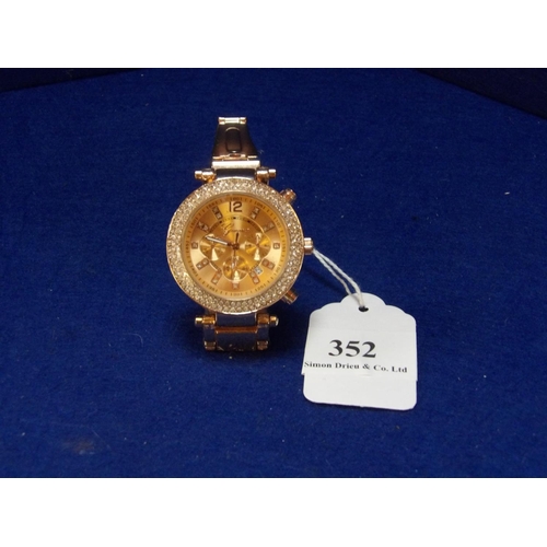 352 - A Geneva rose gold tone stainless steel wrist watch