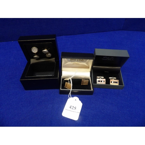 425 - Three pairs of silver cufflinks