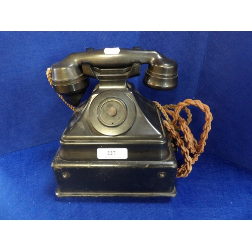 227 - A vintage Bakelite telephone set