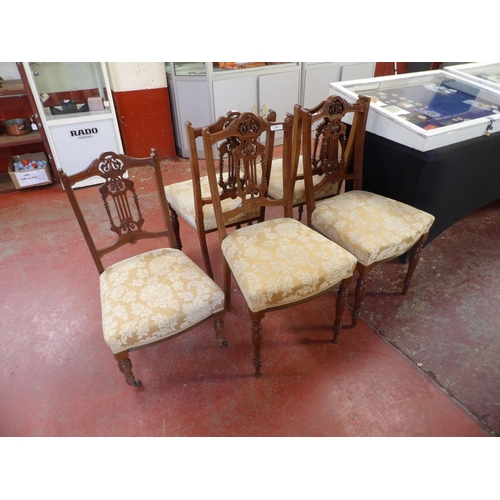 238 - A set of five Edwardian walnut salon chairs