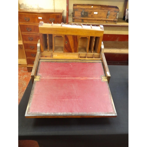 315 - A vintage hard wood and brass mounted writing slope with automated raised gallery