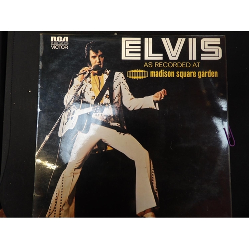 335 - Five Elvis Presley long playing records together with other Elvis Presley memorabilia