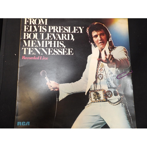 335 - Five Elvis Presley long playing records together with other Elvis Presley memorabilia