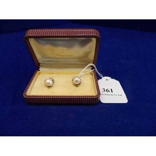 361 - A pair of Mikimoto 9 carat gold and pearl earrings