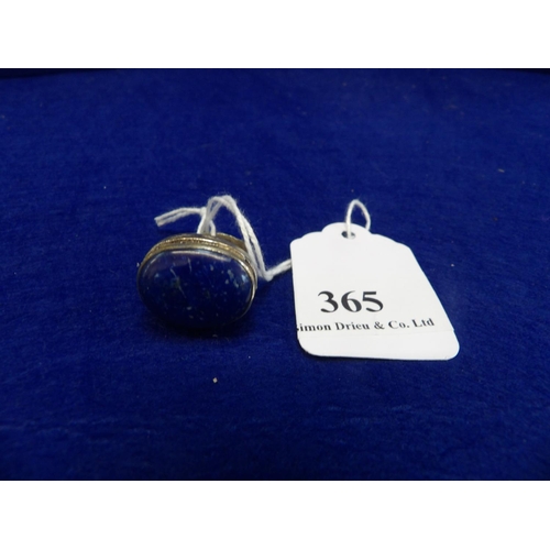 365 - A large Lapis Lazuli gemstone heavily engraved antique silver ring