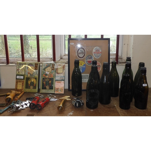 115 - A range of vintage Jersey beer bottles, corkscrews and other bar memorabilia