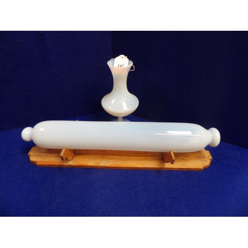 142 - An Opaline glass vase together with a vintage Opaline glass rolling pin mounted upon a wooden stand