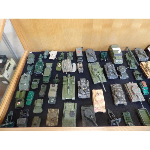 199 - A large and diverse collection of diecast military tanks and other military vehicles