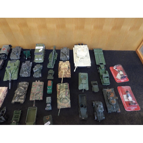 199 - A large and diverse collection of diecast military tanks and other military vehicles