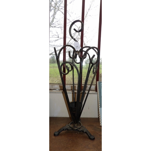 121 - A wrought metal umbrella and stick stand