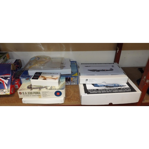 124 - A large and diverse assortment of diecast model aircraft, air craft modelling kits etc.