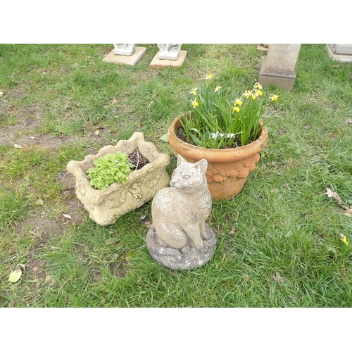 17 - A reconstituted stone model of a cat together with a reconstituted stone garden planter and a terrac... 