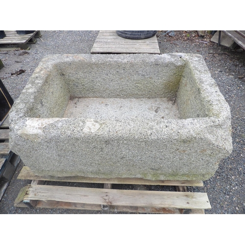 36 - A substantial well cut Jersey granite trough (110cm x 70cm)