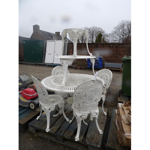 59 - A pierced aluminium circular garden table together with four matching chairs and two occasional tabl... 