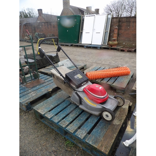 60 - A Honda QD electric lawn mower