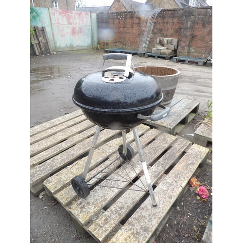 66 - A Weber kettle barbeque