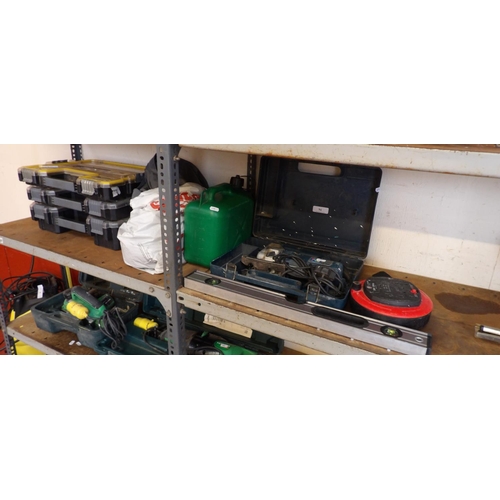 94 - Three Stanley Fatmax storage boxes and contents, a Bosch jigsaw, a spirit level an extension reel et... 