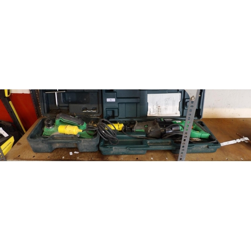 96 - A Hitachi 110 volt recipitating saw together with a Hitachi 110 volt planer