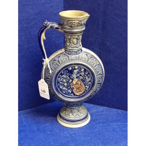 148 - A vintage salt glazed ewer by Simon Peter Gerz