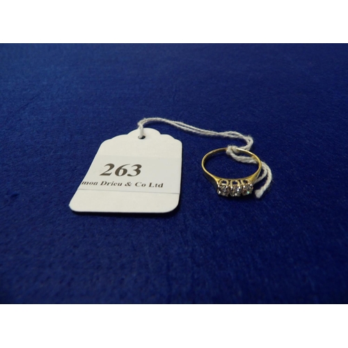 263 - An 18 carat gold ring set with three diamonds size Q