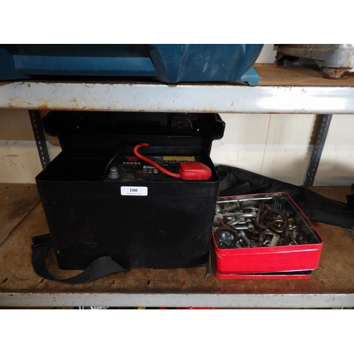 100 - A Yuasa battery and battery box together with a quantity of various shackles