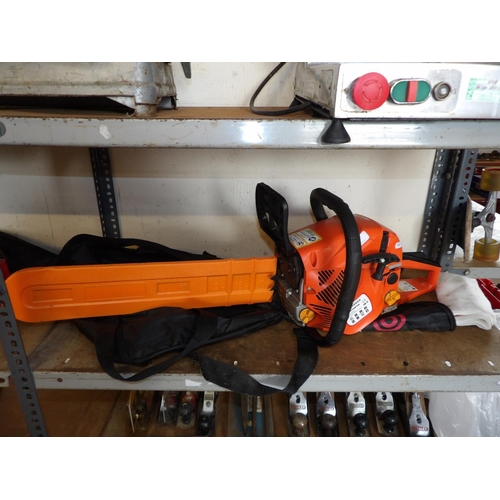 101 - A Parker petrol chainsaw complete with storage bag