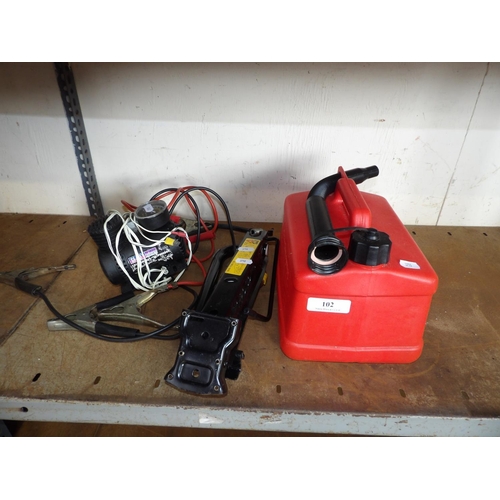 102 - A Sealey 12 volt compressor, a set of jump leads, a jack and a fuel can