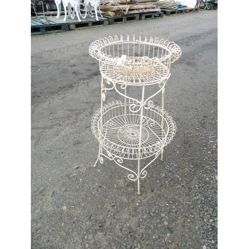 52 - A two tier circular wire work plant stand