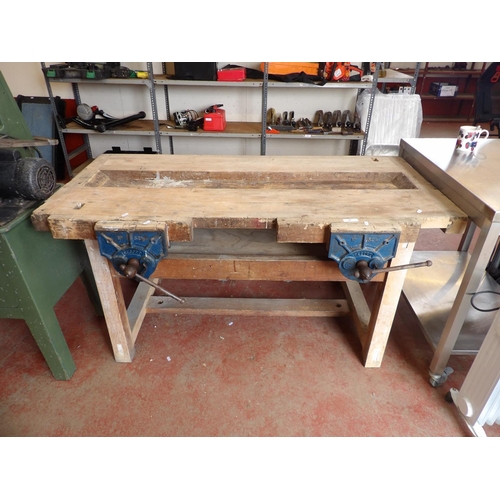 87 - A substantial carpentry work bench fitted with two Record no. 52 1/2 vices