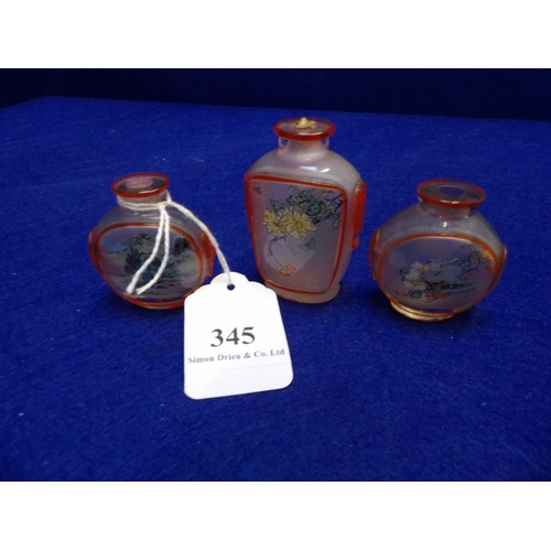 345 - Three oriental snuff bottles