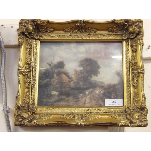 369 - A gilt framed picture depicting a shepherd driving his sheep