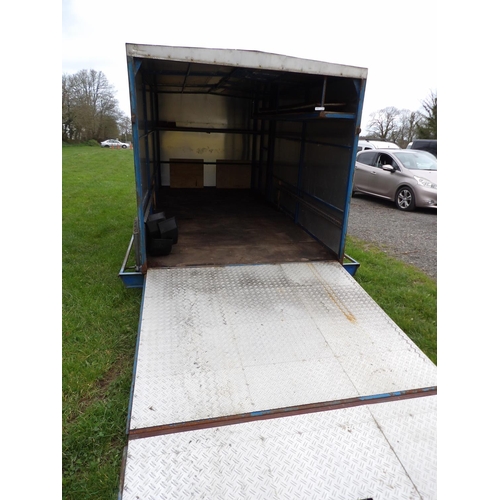 35 - A fully covered aluminum clad tandem axle transporter trailer