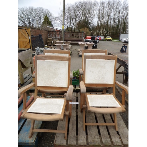 69 - A set of four Royal Craft teak and fabric upholstered garden chairs