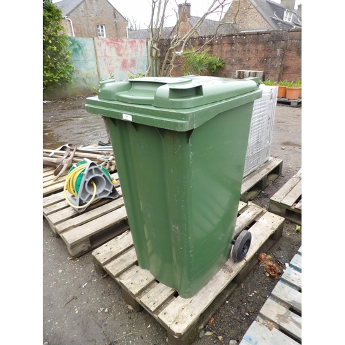 83 - A green PVC wheelie bin