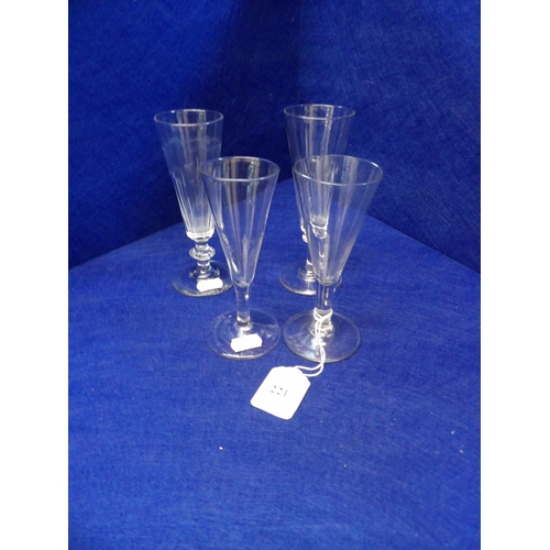 221 - Four vintage champagne flutes