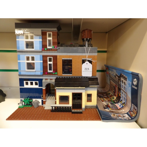 223 - A Lego Creator Detective's Office with mini figures and instruction book, model no. 10246